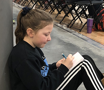 Teen writing a letter - Credit Jaci Foged